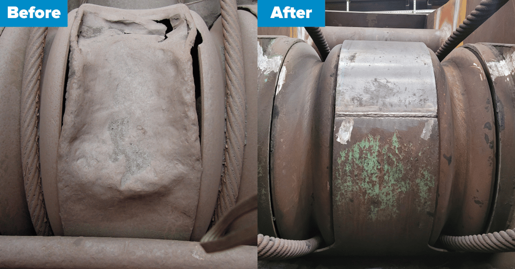 Worn grab structure with visible wear and repaired reinforced weld seams after maintenance