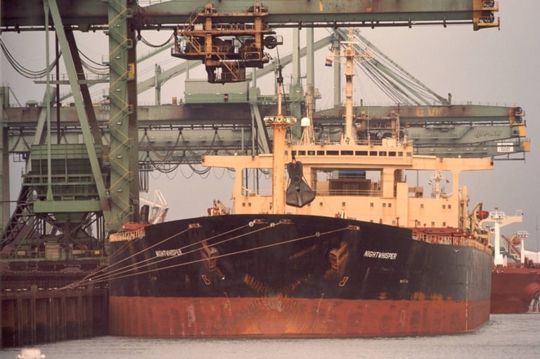 Unloading ship in harbor