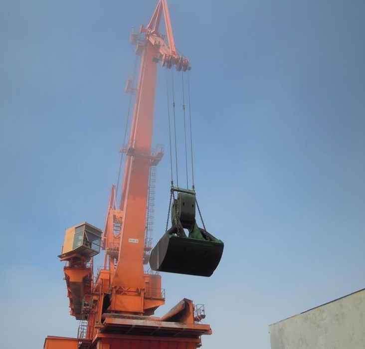 Crane with grab